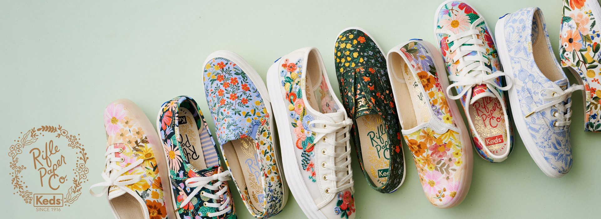 Rifle Paper Company plus Keds, since 1916 logo. Selection of shoes with flower prints from collection.
